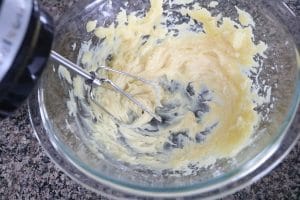 Whipped honey body butter recipe in process image handheld mixer whipping the body butter