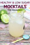 Pin image with text: mason jar with non-alcoholic lim margarita with sliced limes on and around it