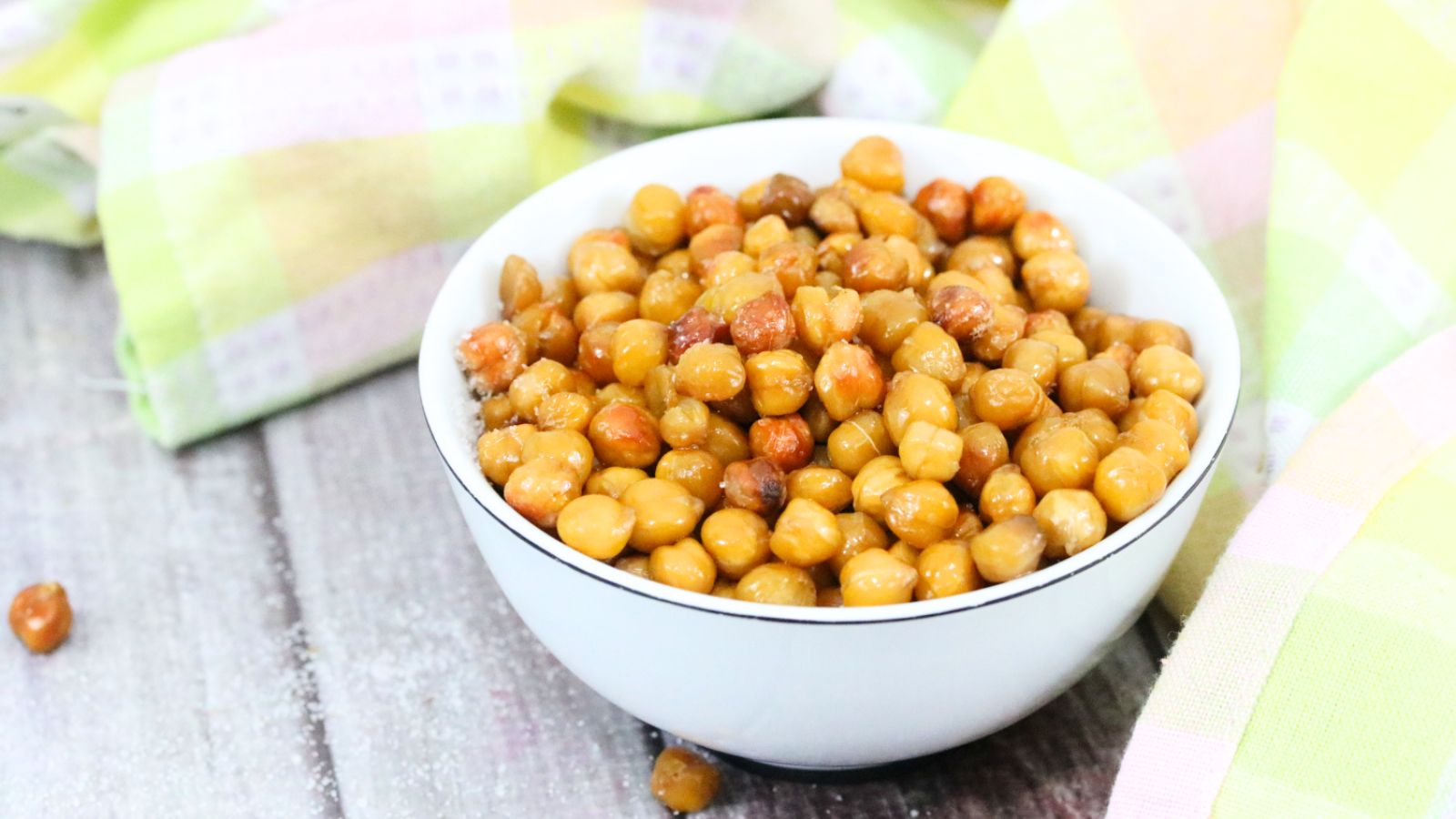 Roasted chickpeas in a white bowl.