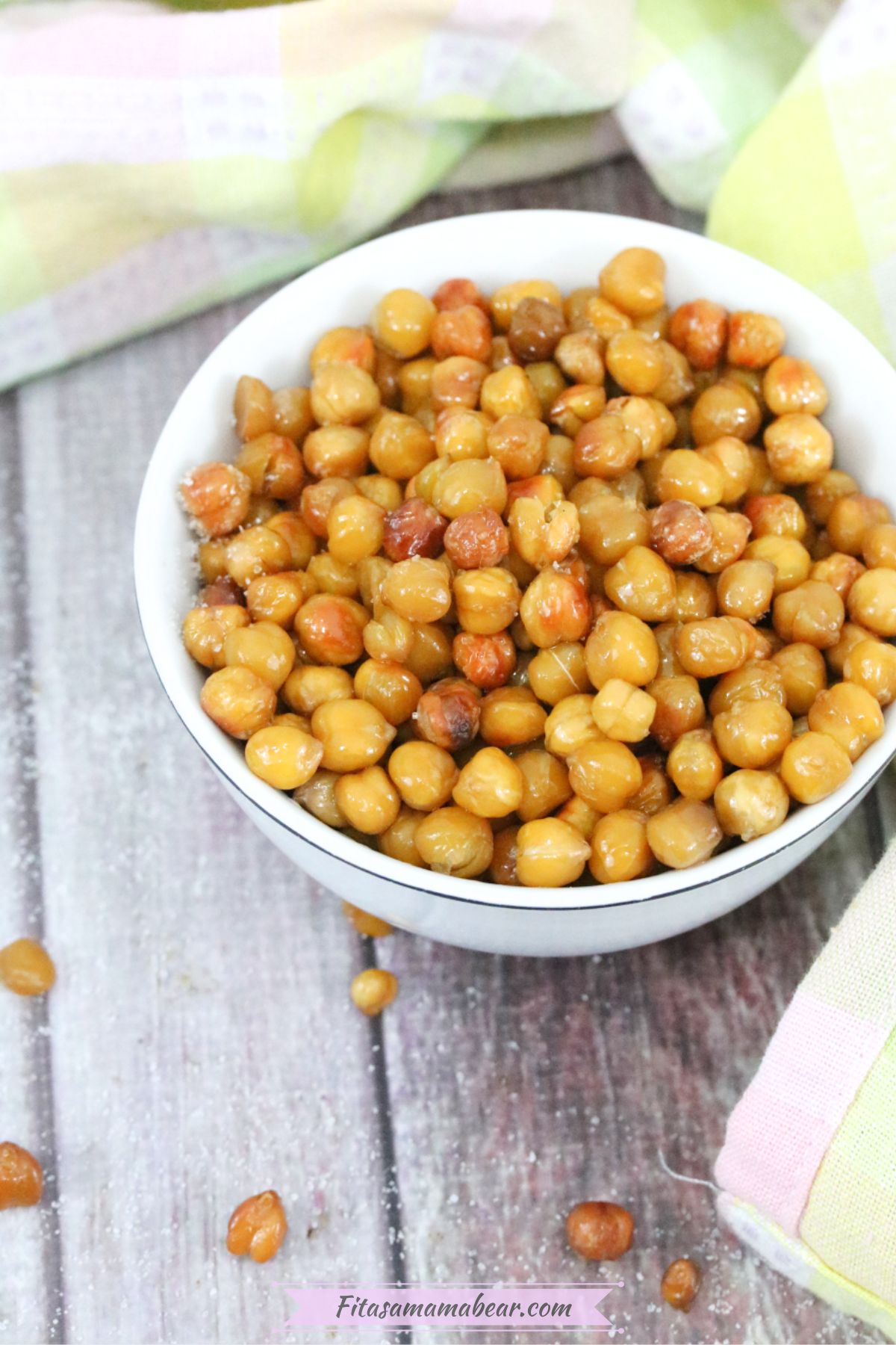 White bowl with roasted chickpeas in it.