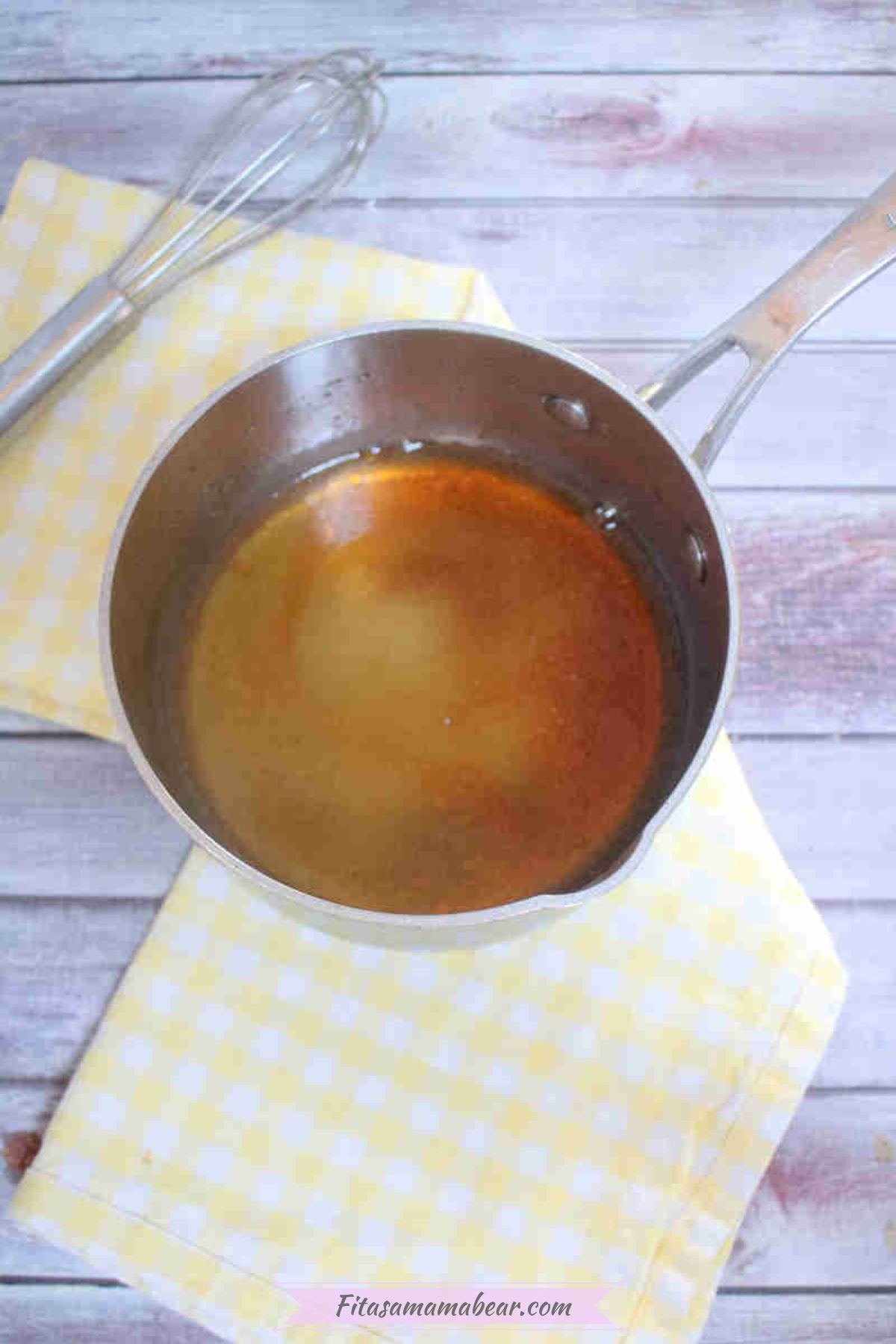 Small pot with homemade teriyaki sauce in it.