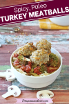 Pin image with text: easy, paleo, turkey meatballs in a white bowl on top of tomtoes, broccoli, spaghetti squash and mushrooms