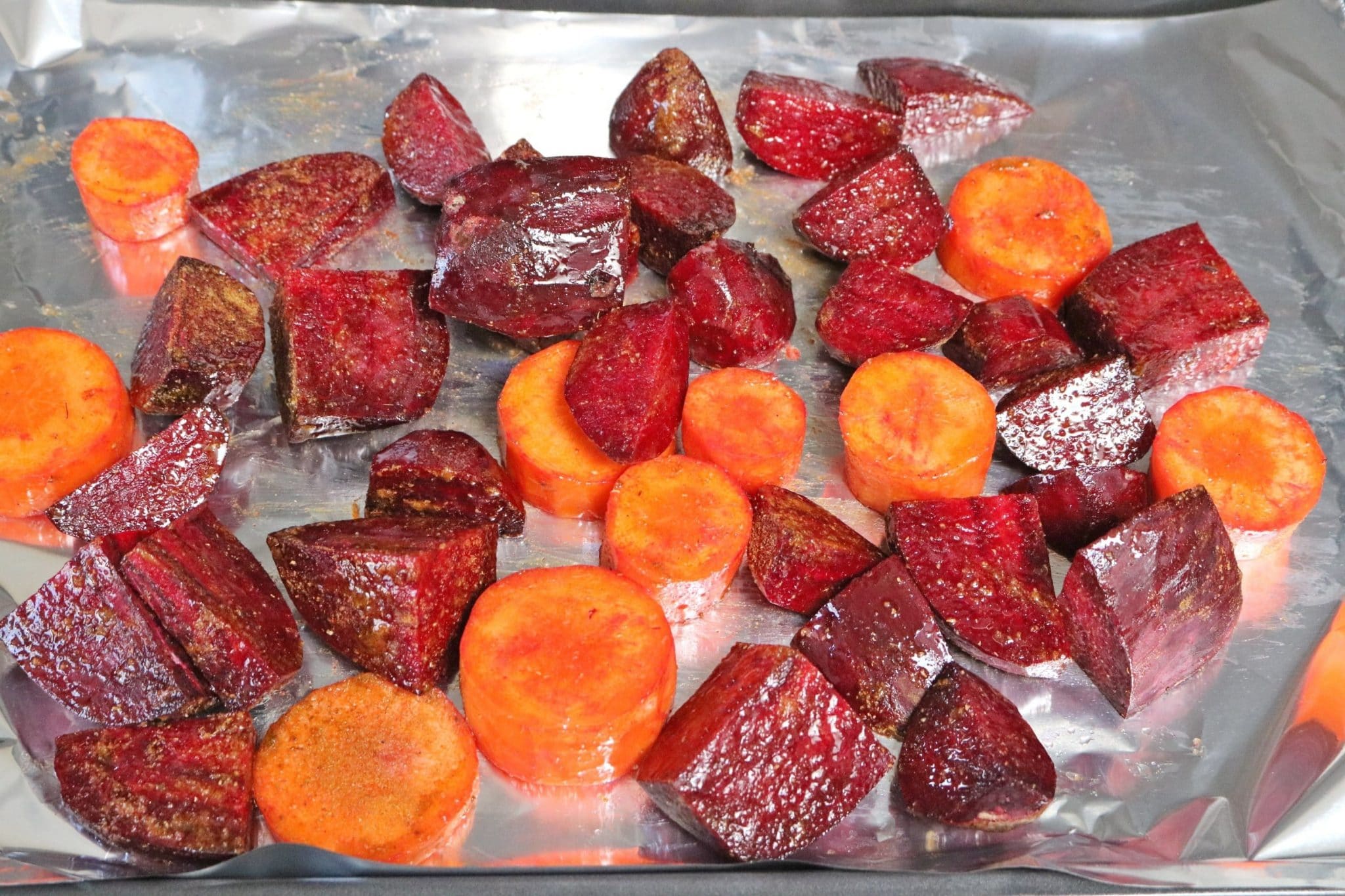bets and carrots read to roast on baking tray