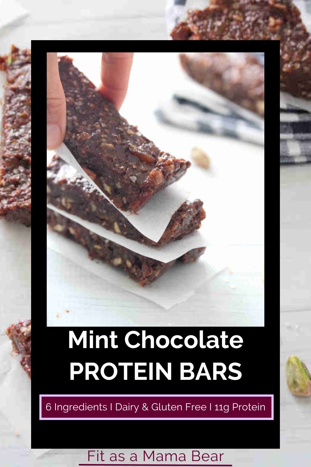 Fingers placing a mint chocolate protein bar onto a stack and text below the image.