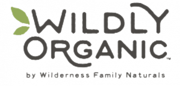 Text on a transparent background titling "wildly organic" with a green leaf beside it