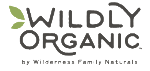 Text on a transparent background titling "wildly organic" with a green leaf beside it