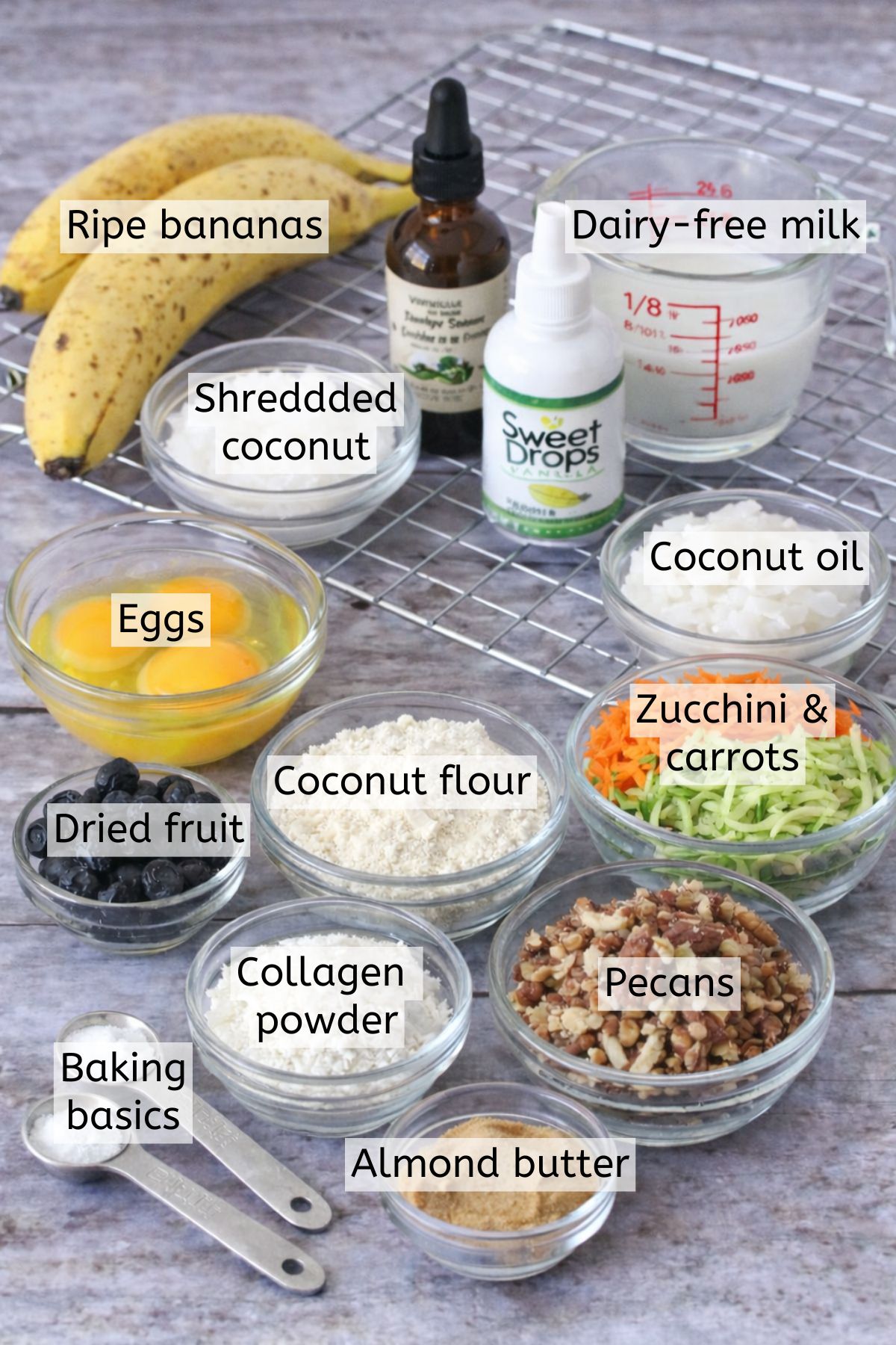 Multiple ingredients to make muffins in bowls with text labels over top.