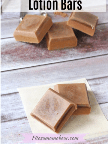 Pinterest image with text: diy chocolate lotion bars stacked on parchment paper with teaspoons behind them