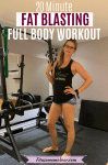 Pinterest image with text: woman in a black tank top and blue shorts in a home gym posing for the camera with text about a 20-minute full-body workout