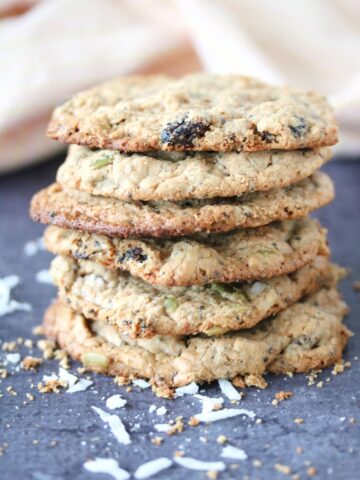 Vegan protein cookies stacked one on top of another.