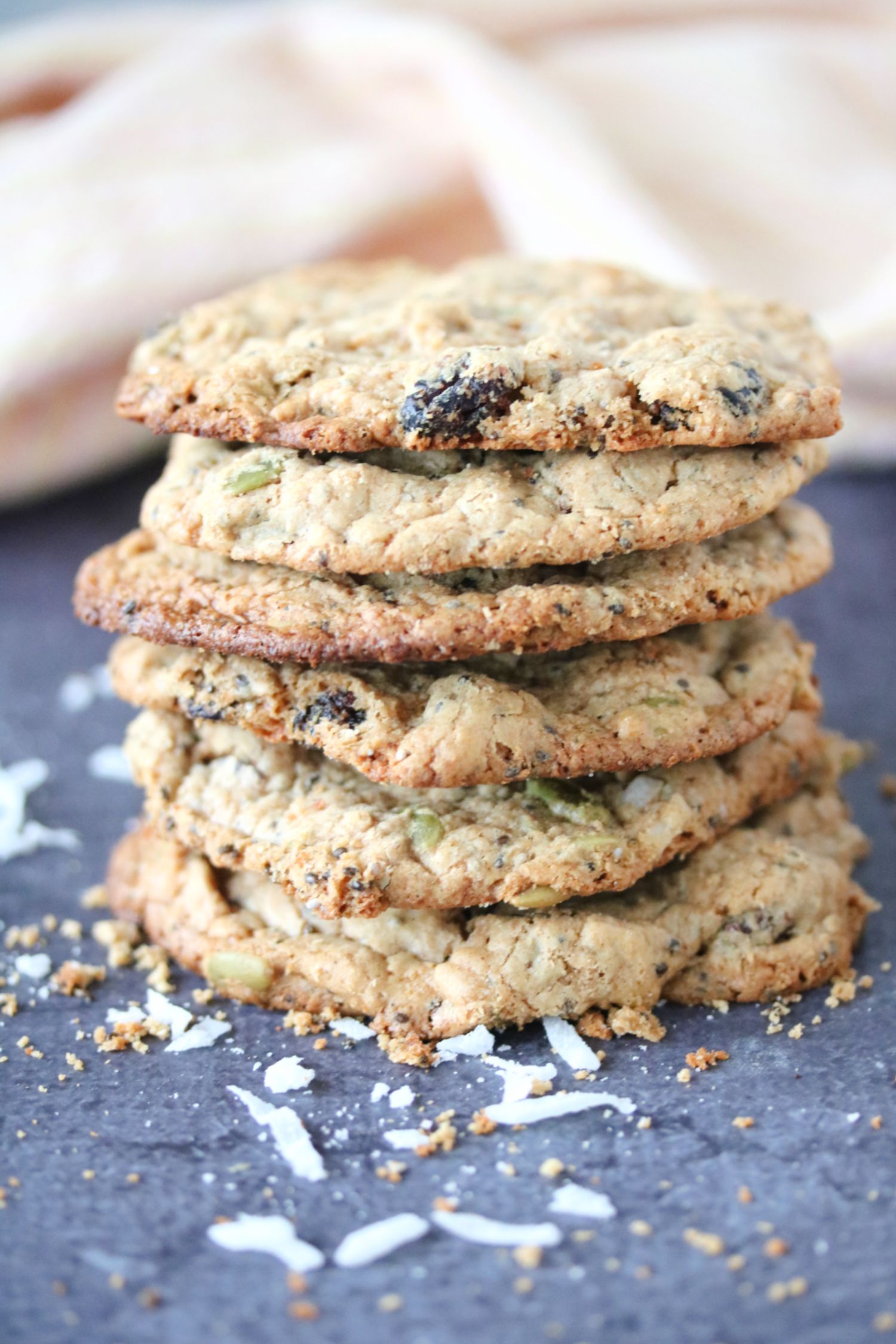 Vegan protein cookies stacked one on top of another.