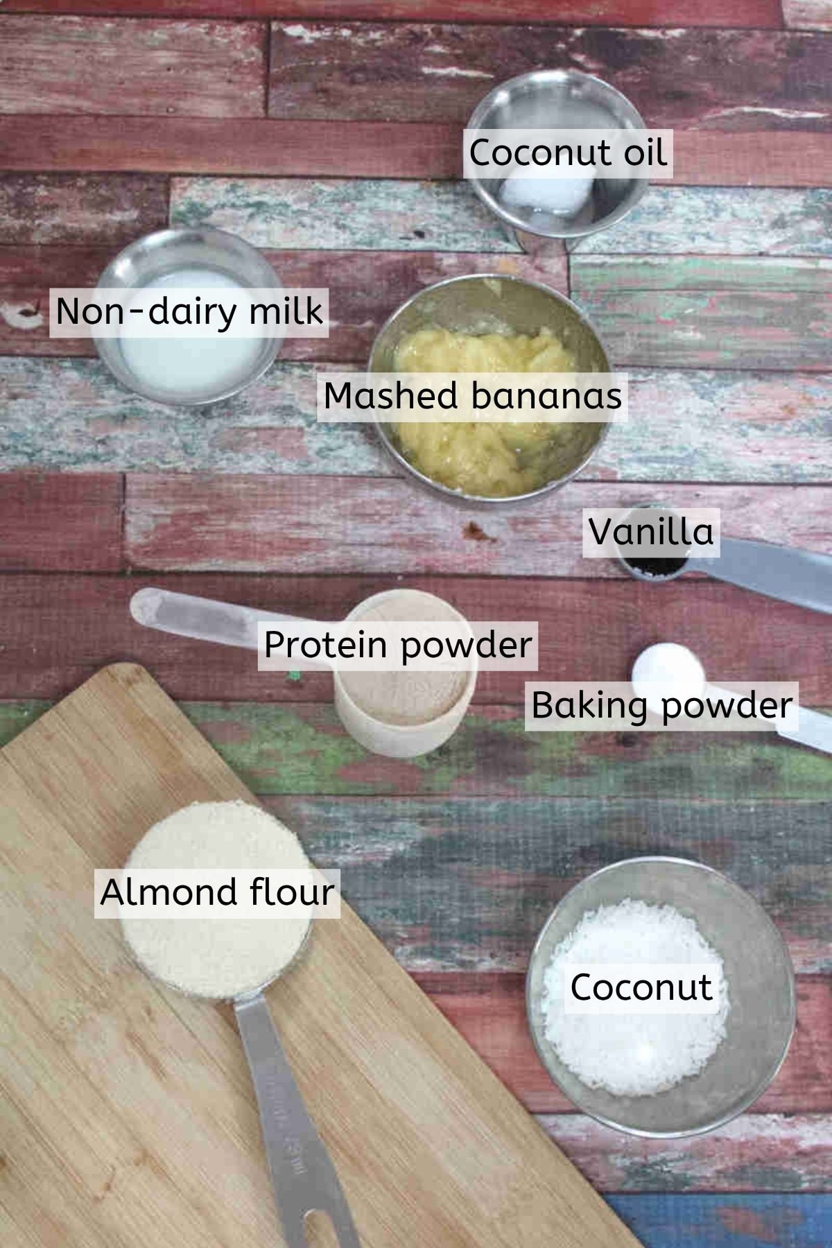 Bananas, oil, almond flour, and protein powder all with text labels over the top.