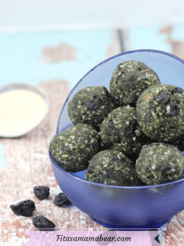 Featured image with text: superfood energy balls in two glass blue bowls stacked with collagen powder behind them and dried blueberries around them