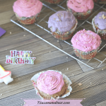 Featured image with text: pink and purple sugar-free cupcakes on a cooking rack
