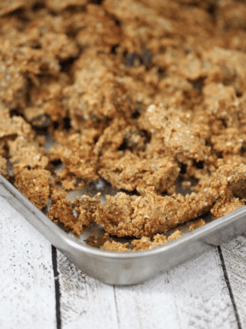 Healthy, homemade granola on a baking tray
