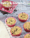 Pin image with text: Gluten-free protein muffins with chocolate chips in red muffin cups on a baking tray with more chocolate chips behind them and another muffin on a red napkin