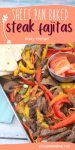 Pin image with text: Baking tray with cooked steak, bell peppers, and veggies with a steel bowl of fresh tomatoes in the middle and flour tortillas folded to the side