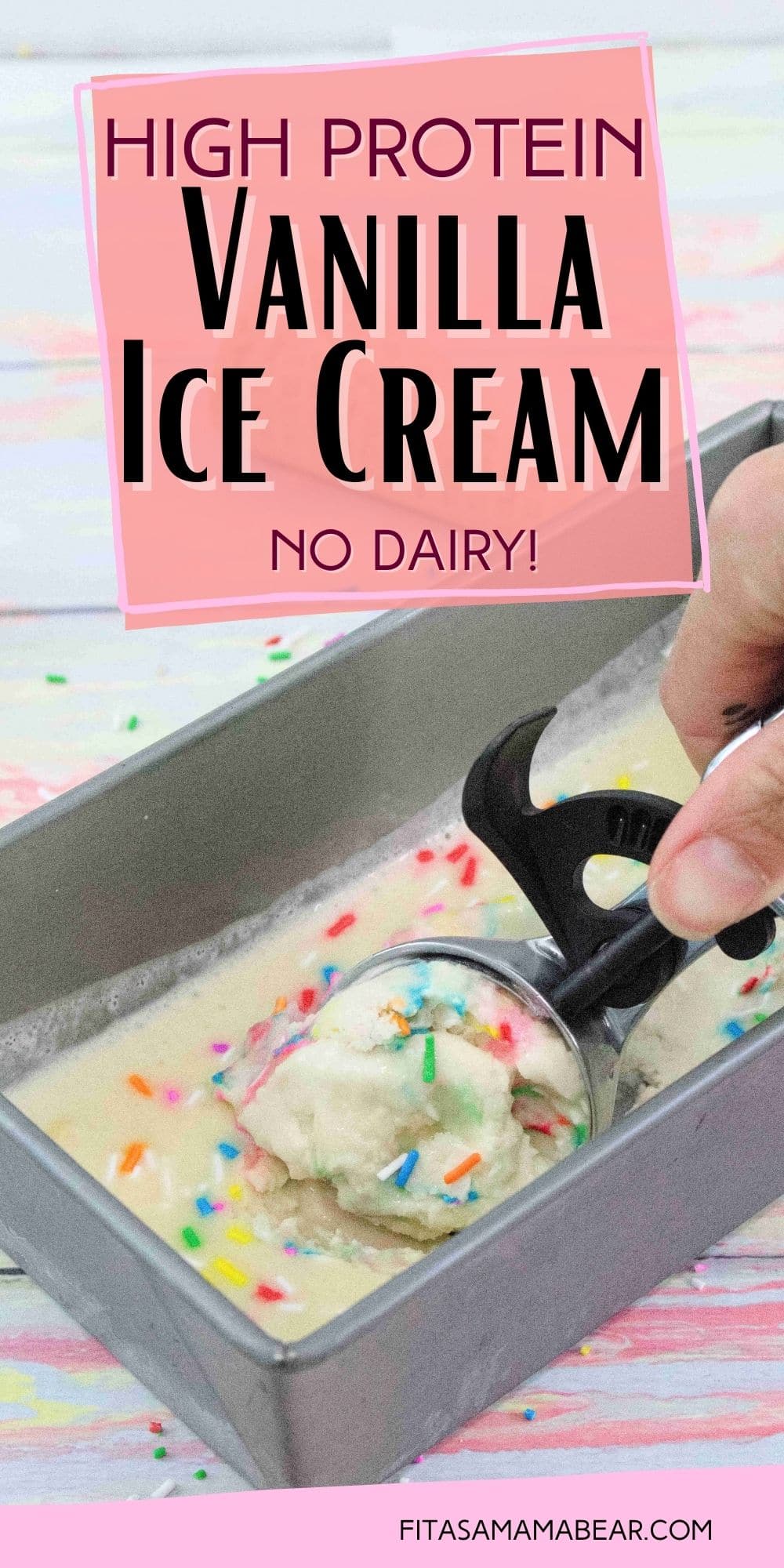 Pin image with text: hand using a black and steel ice cream scoop t scoop out vanilla protein ice cream with sprinkles from a baking tin with ice cream cones and sprinkles around it