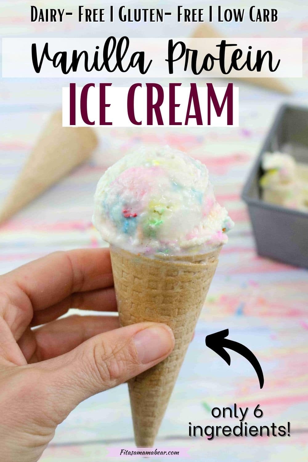 Pin image with text: hand holding vanilla protien ice cream with sprinkles in a gluten-free ice cream cone with cones, sprinkles and the ice cream tin behind it