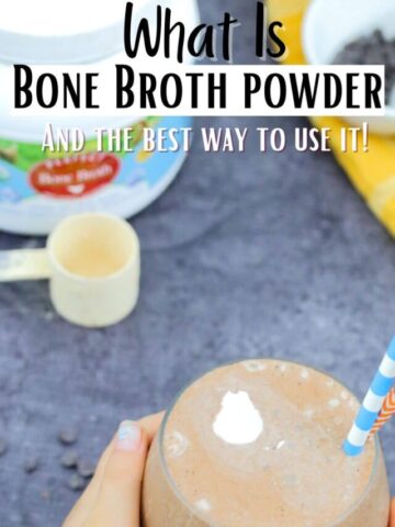 Pinterest image with text: vegan chocolate smoothie in a glass with toddler hands holding it