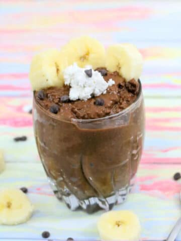 Featured image: chocolate chia seed pudding topped with banana, coconut whip, and chocolate chips