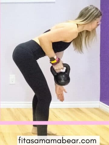 Woman bentover rowing a dumbbell to her side