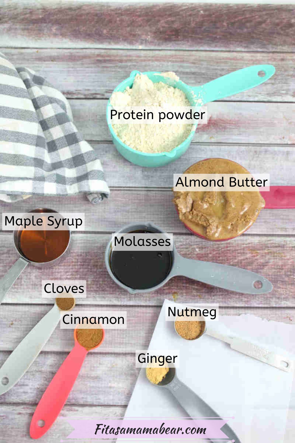 Ingredients to make gluten-free protein bars in measuring cups with text labels over them.