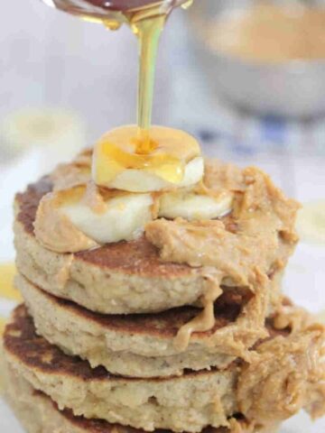 Two images of peanut butter pancakes topped with bananas and peanut butter on a white plate with syrup being poured on it.