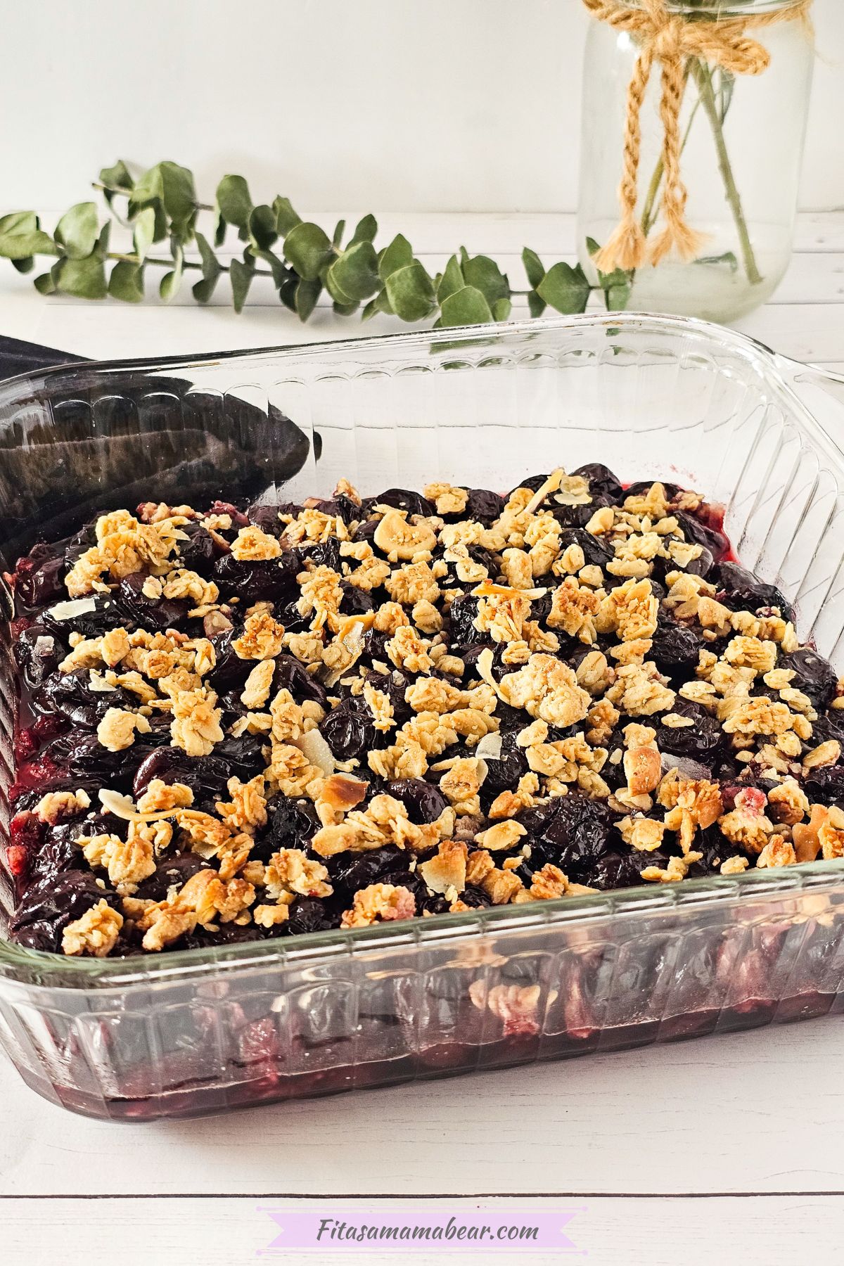 baked cherry granola crisps in a baking pan
