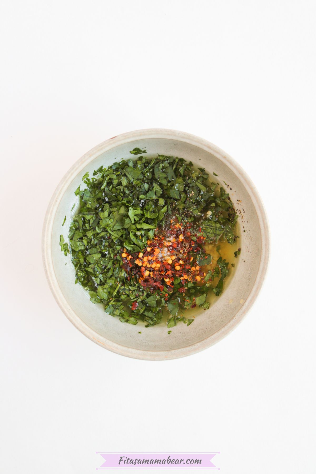 red wine garlic, seasonings, garlic, parsley and oil mixed in a small bowl