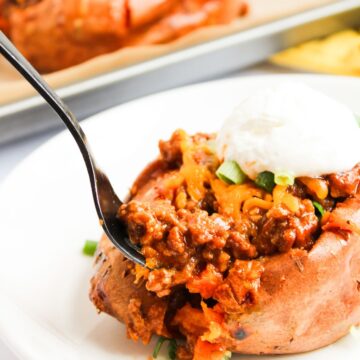 A spoonful of baked sloppy joe sweet potato.