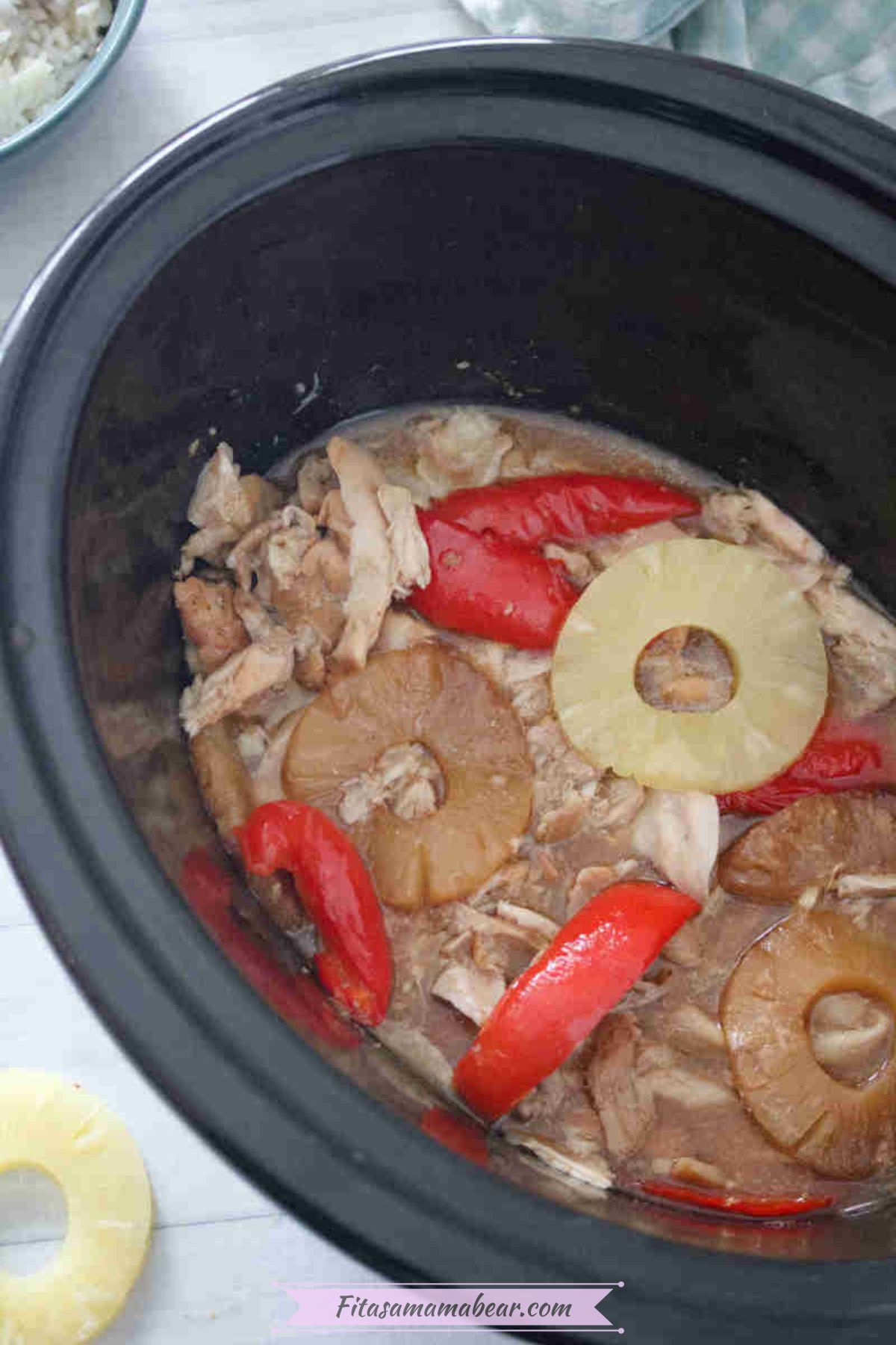 Slow cooker Hawaiian chicken with pineapples and peppers.