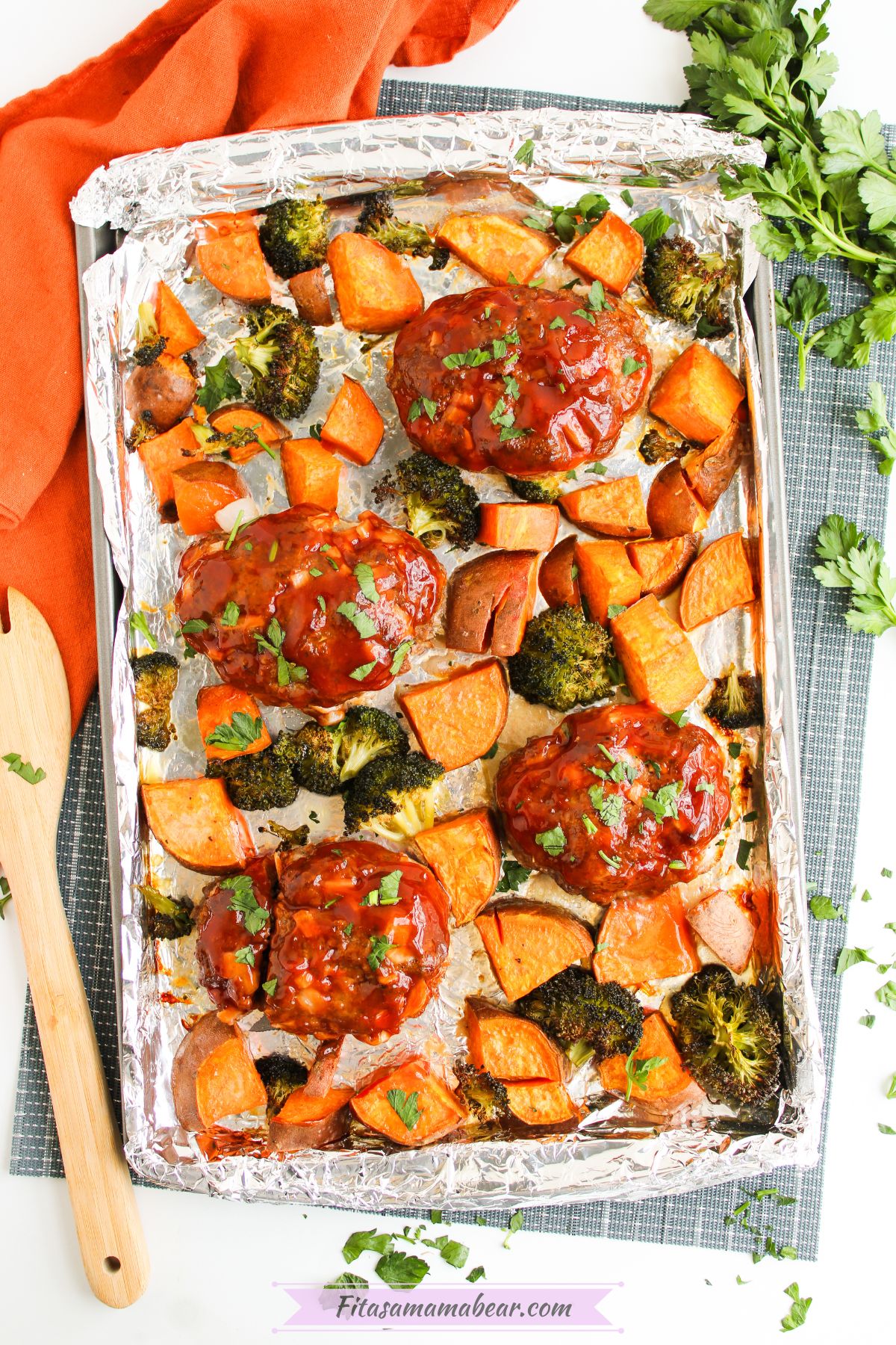 Sheet pan barbeque meatloaf with roasted vegetables.