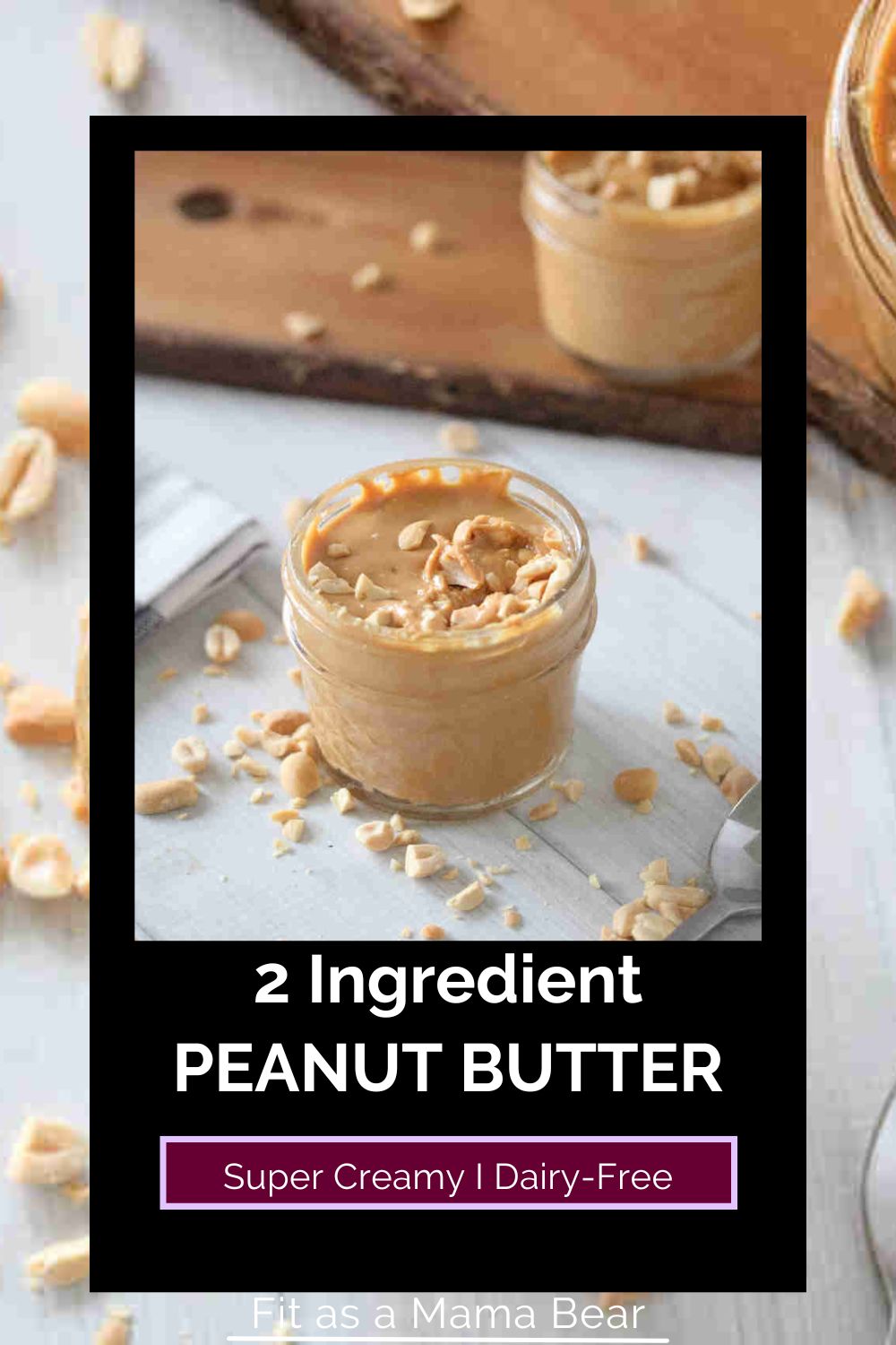 Homemade peanut butter in a mason jar topped with peanuts and more peanuts around it and text on the image.