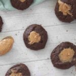 Dark chocolate Greek yogurt cookie pieces with peanut butter toppings.