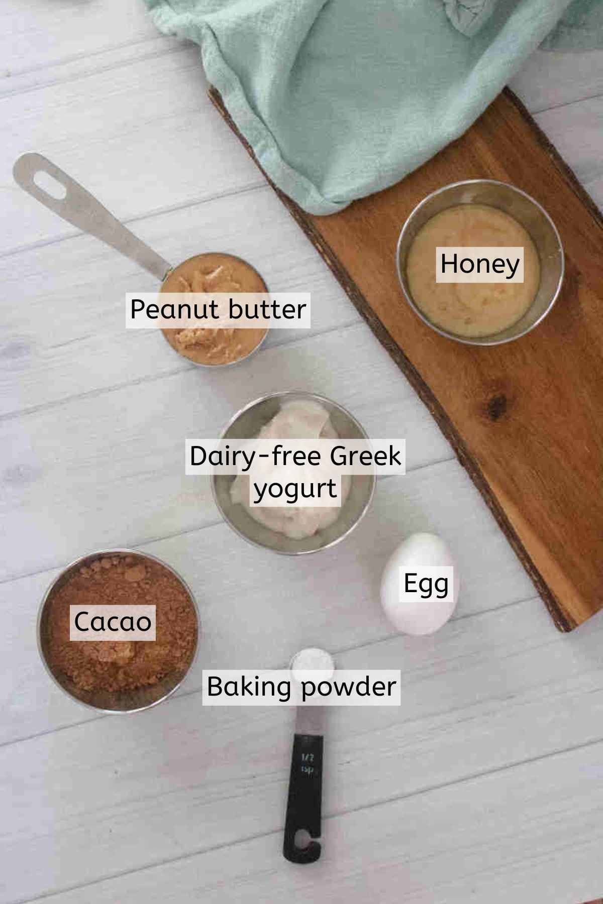 Honey, peanut butter, greek yogurt, egg, cocoa powder, and baking powder.