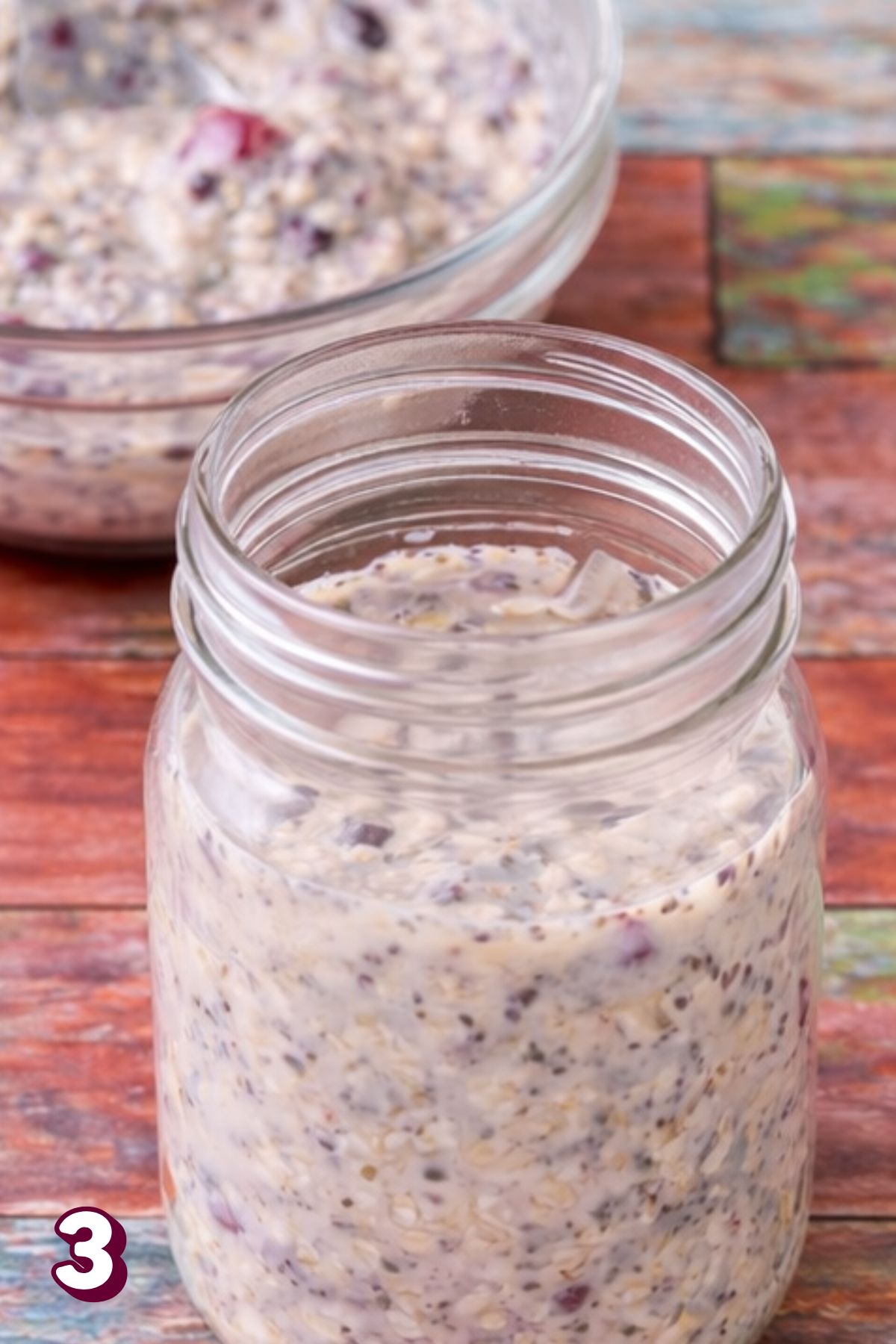Dairy-free overnight oats with chia seeds in a mason jar.