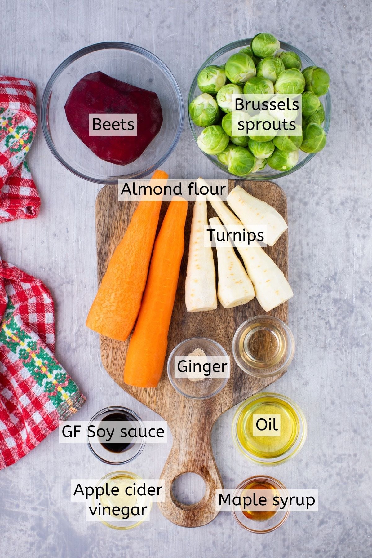 Carrots, Brussels, turnips, beets, and seasonings all with text labels over top.